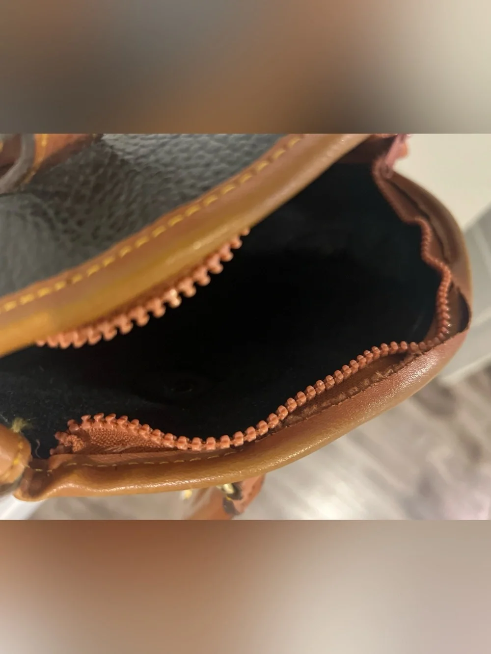 Dooney & Bourke Black with Brown Trim Pebbled Leather Satchel